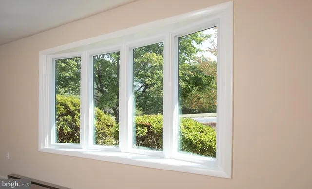 a bathroom with a shower and a bath tub