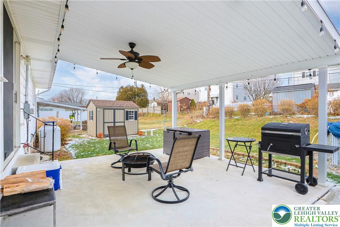 1322 Valley Road Bethlehem, PA 18018 - Photo 26 of 32 Out the Sliding Kitchen Doors to a Large Covered Porch