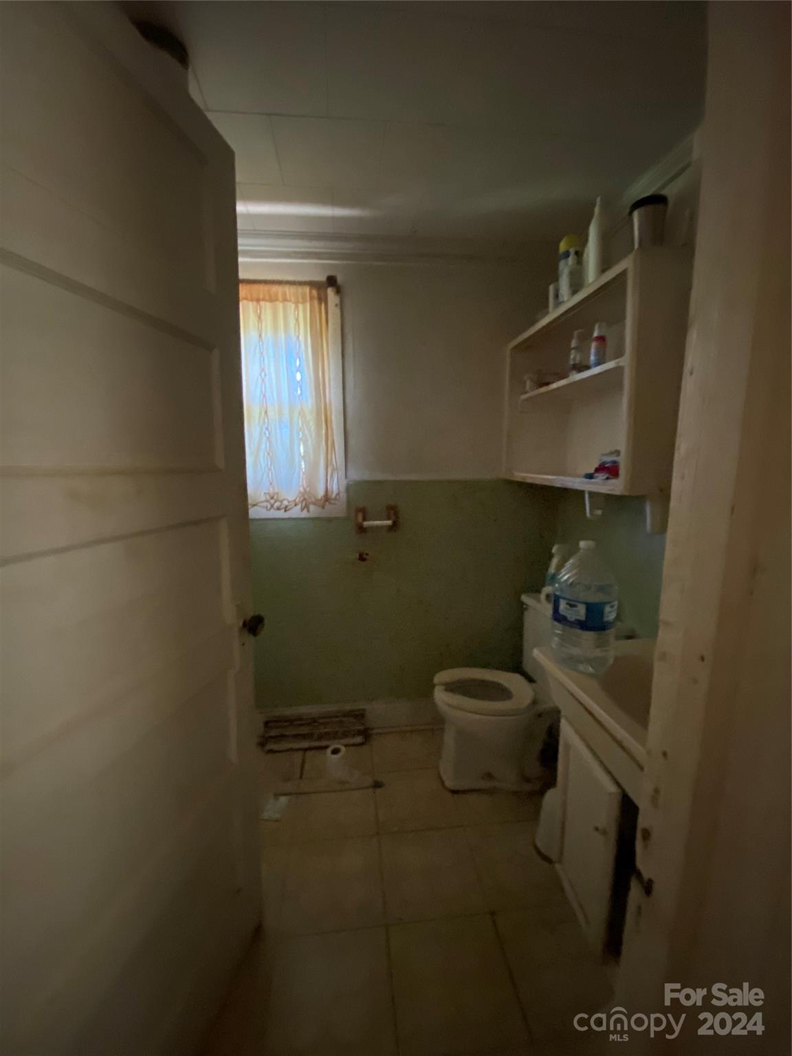 771 Spindale Street Spindale, NC 28160 - Photo 5 of 14 a bathroom with a toilet and a sink