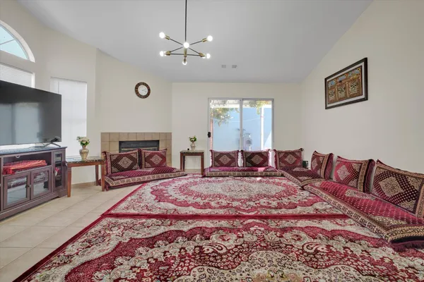 a bedroom with bed and cupboard