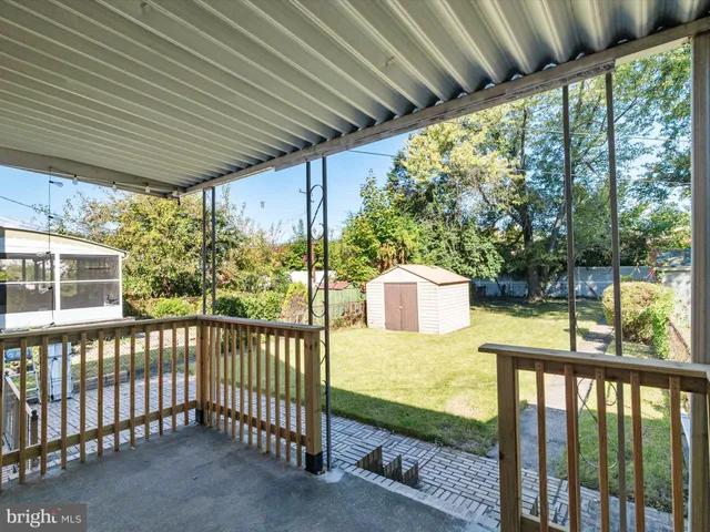 a view of swimming pool with a backyard
