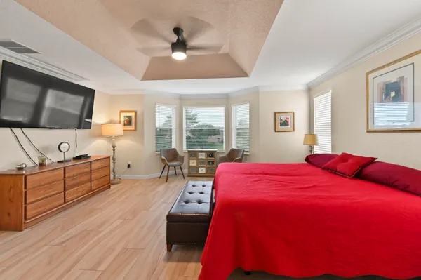 a bed room with a bed and a couch