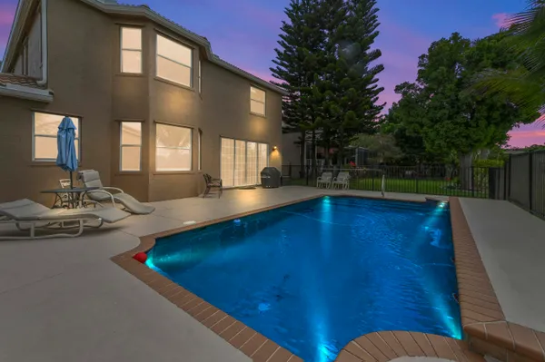 a view of a patio with swimming pool