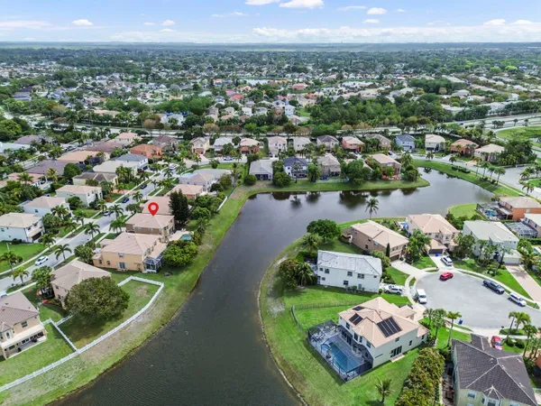 an aerial view of a house with a garden