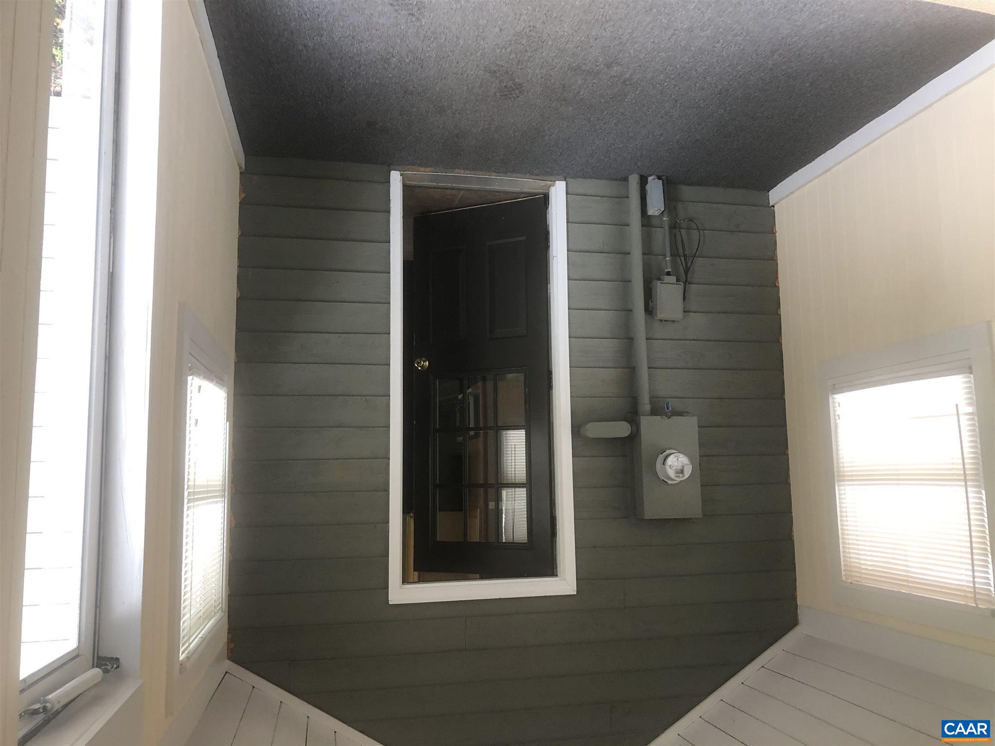 2811 Amicus Road Stanardsville, VA 22973 - Photo 22 of 27 wooden floor and window in an empty room