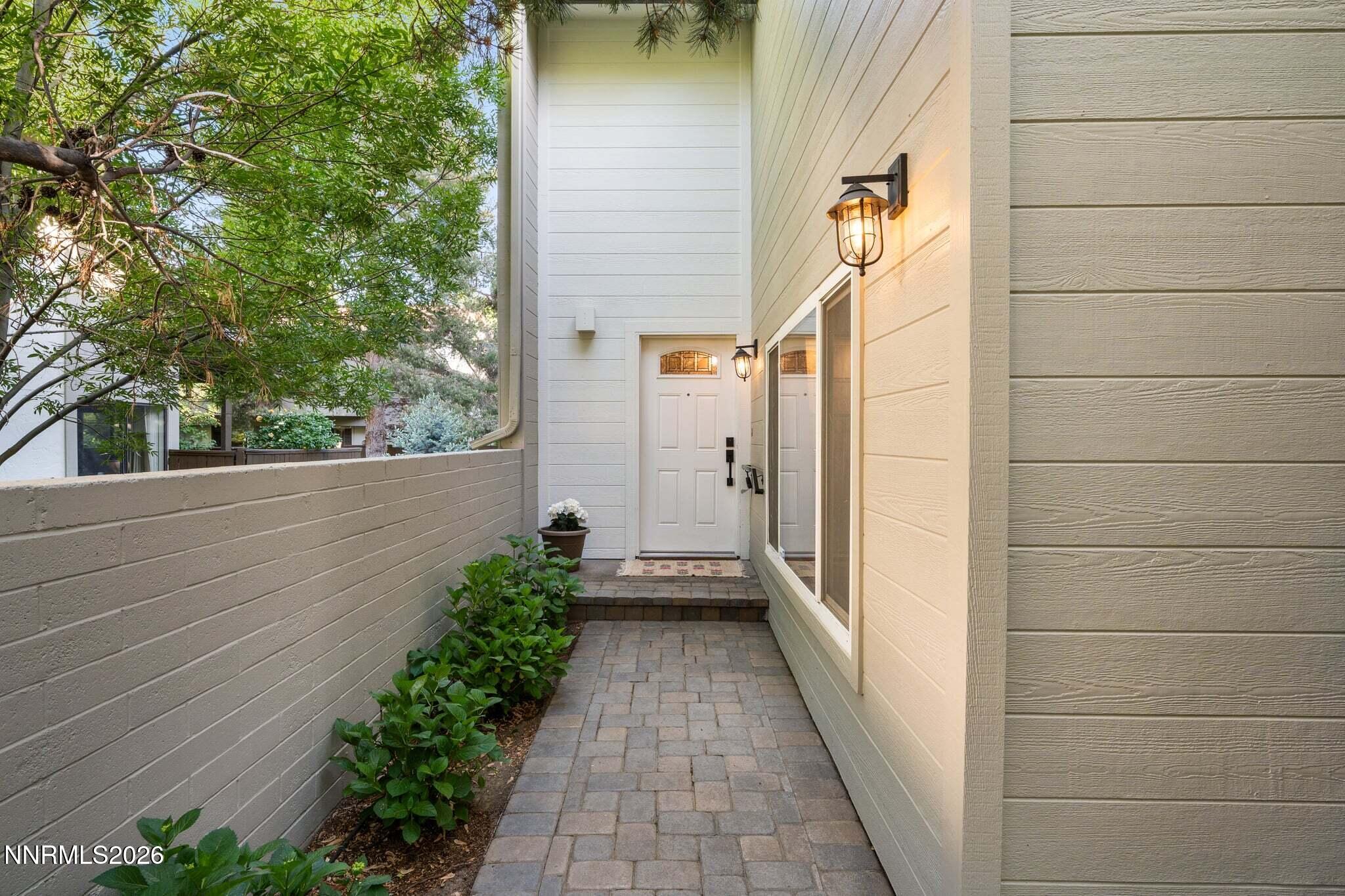 430 Angela Place Reno, NV 89509 - Photo 7 of 48 a view of a pathway besides a house