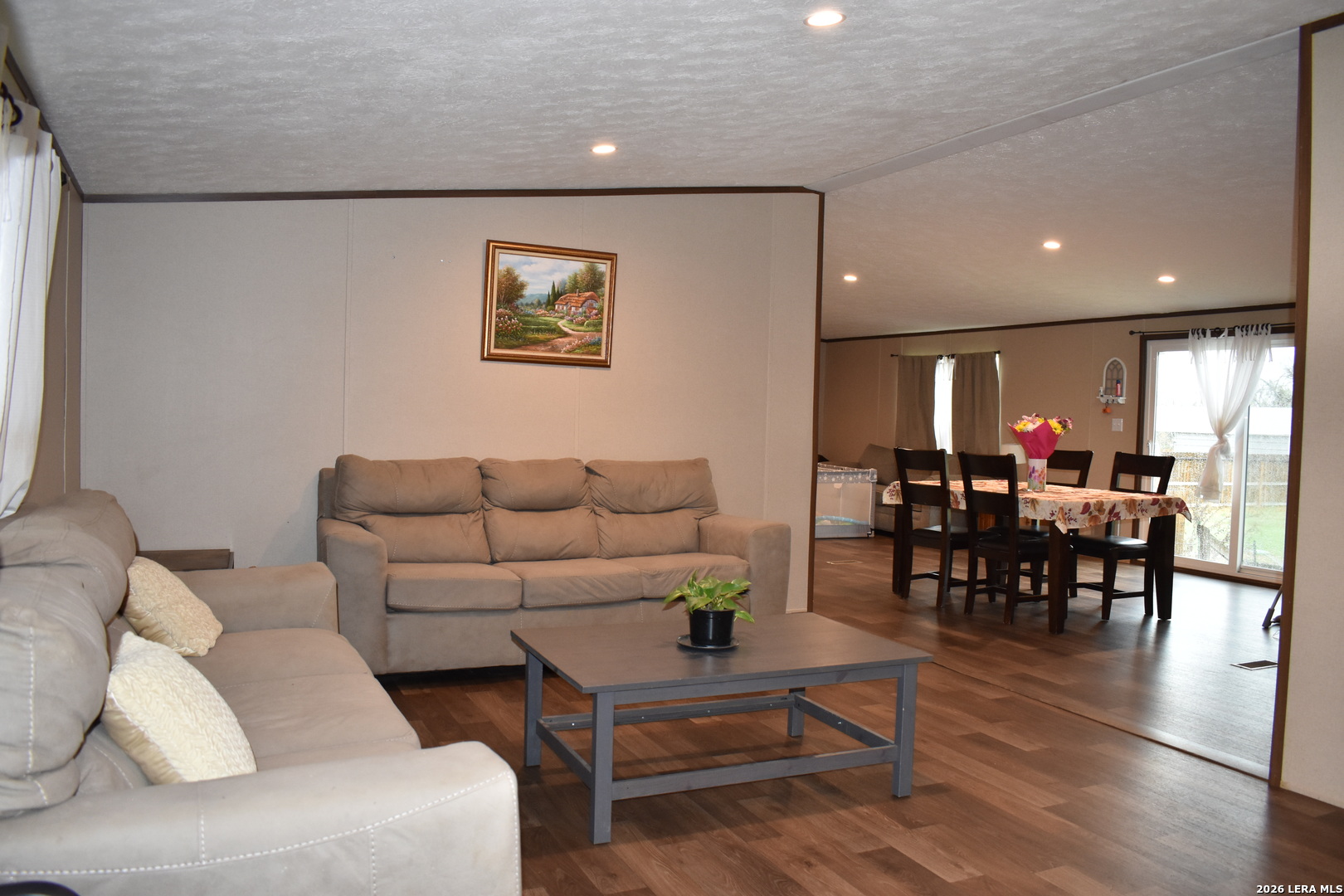 17016 Rancho Escondido Atascosa, TX 78002 - Photo 5 of 14 a living room with furniture and wooden floor
