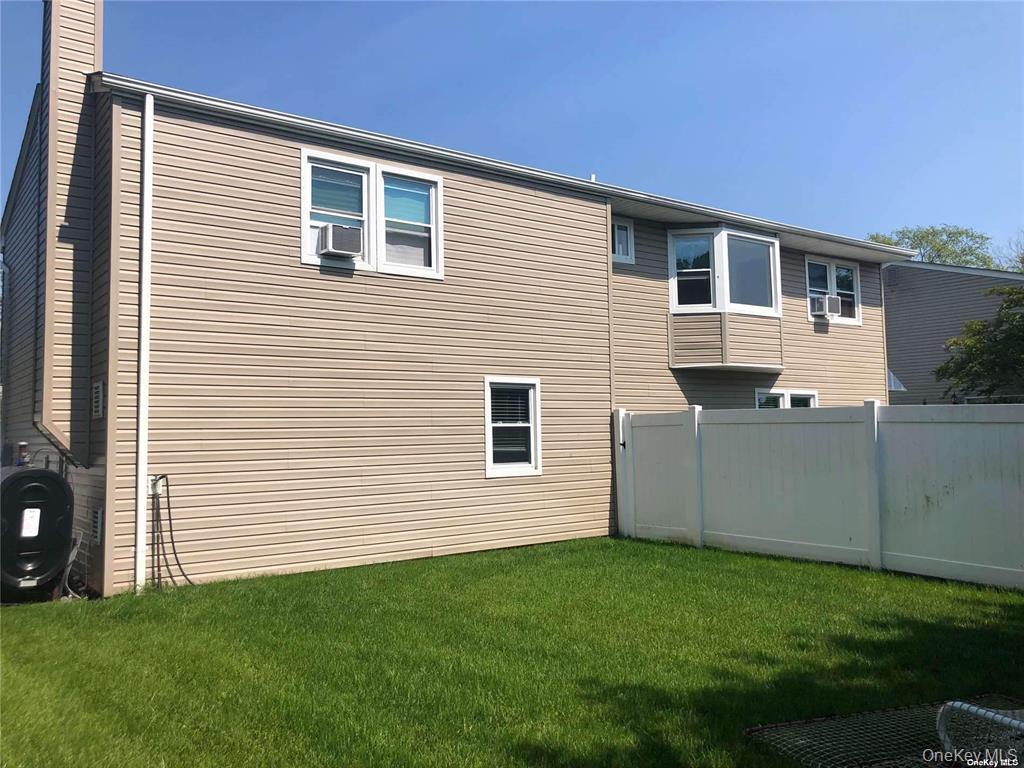 36 Cullen Avenue Islip, NY 11751 - Photo 16 of 16 a view of a house with a backyard