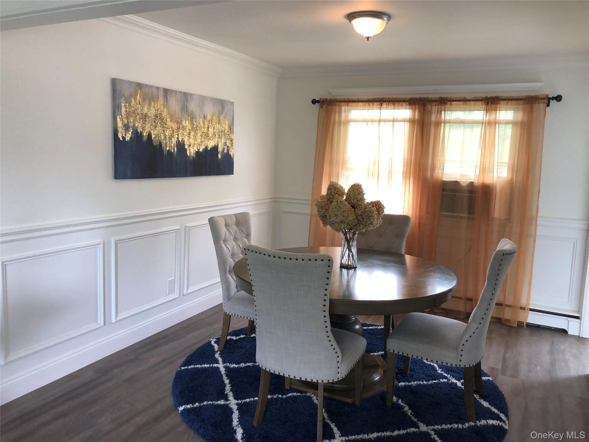 36 Cullen Avenue Islip, NY 11751 - Photo 6 of 16 a view of a dining room with furniture window and wooden floor