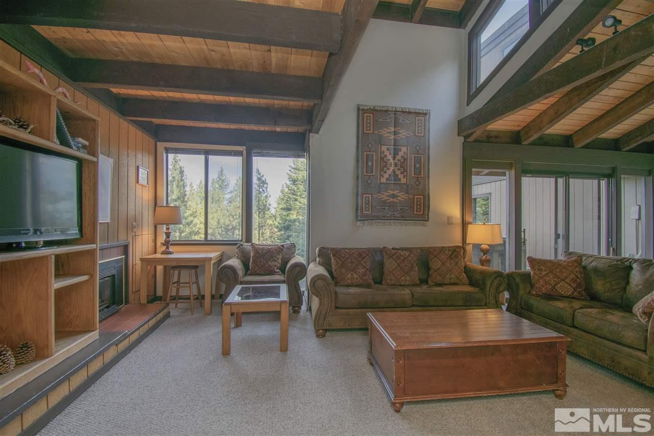 46 Chalet Stateline, NV 89449 - Photo 3 of 18 a living room with furniture and a flat screen tv