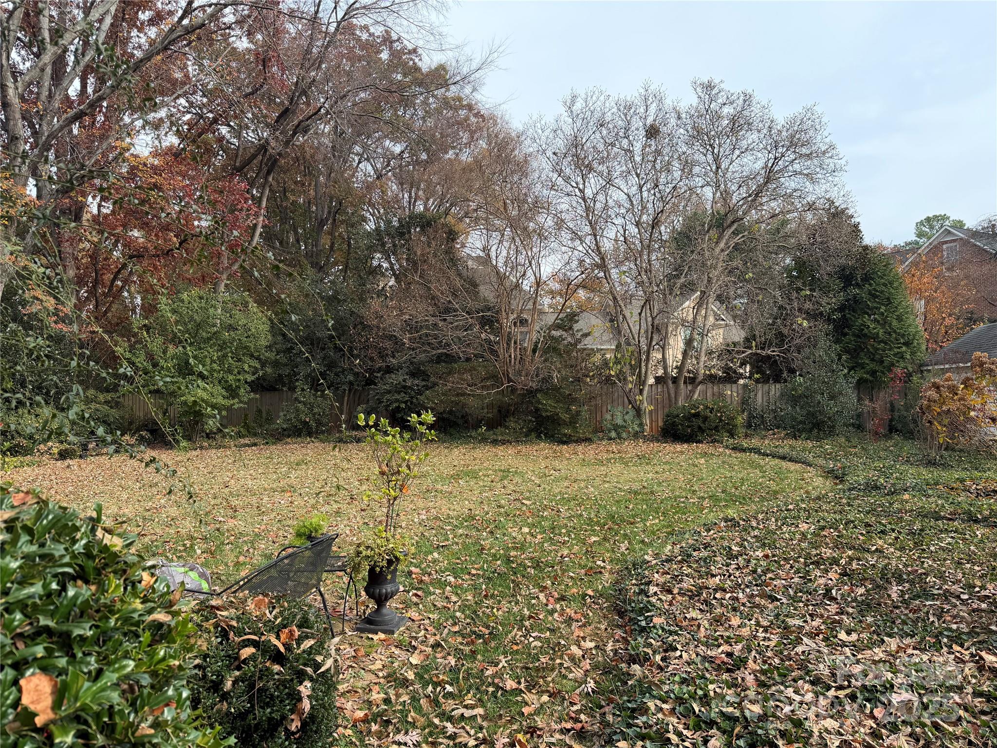 2629 Sharon Road Charlotte, NC 28211 - Photo 2 of 4 a view of a large yard with lots of green space