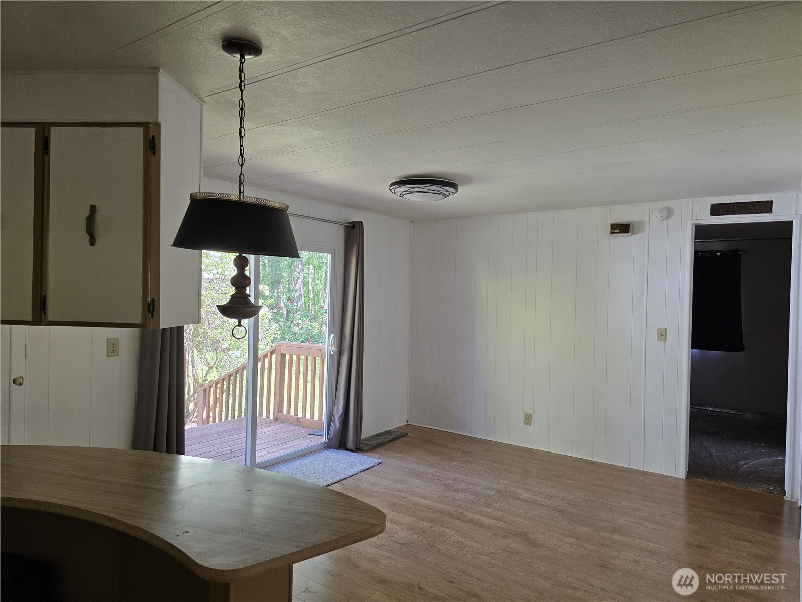147-21 Morris Road, Unit 21 Randle, WA 98377 - Photo 15 of 31 a view of an empty room with a window