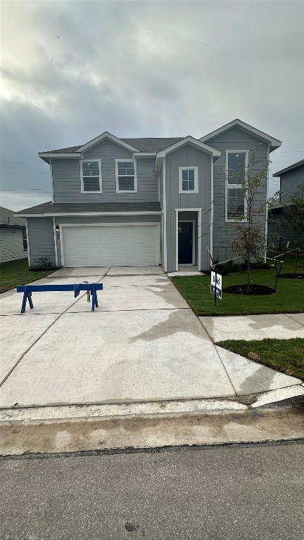 a front view of house with yard