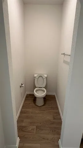 a utility room with a sink a mirror and vanity