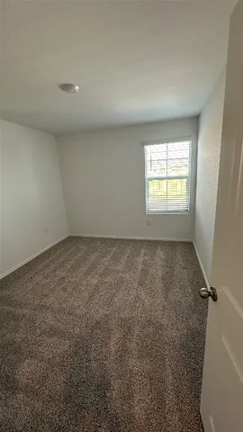 a view of a lake with a big yard