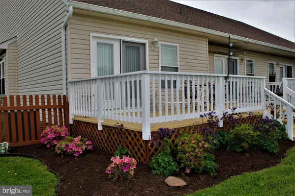 a view of a house with a garden
