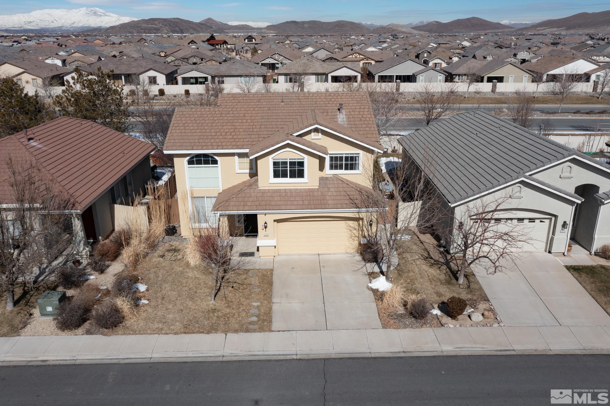2325 Lincoln Meadows Drive Reno, NV 89521 - Photo 3 of 40 an aerial view of residential houses