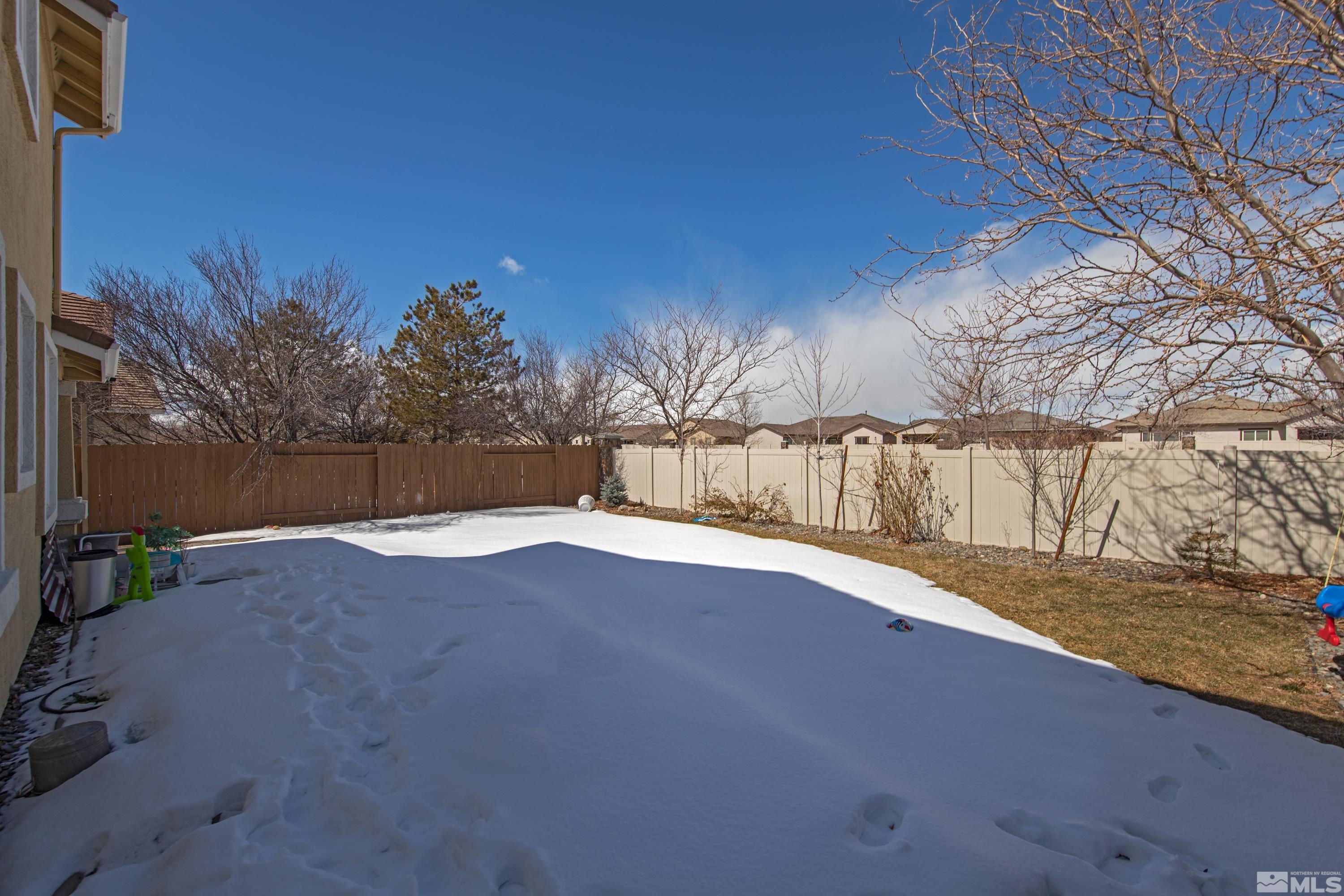 2325 Lincoln Meadows Drive Reno, NV 89521 - Photo 32 of 40 a view of backyard and tree