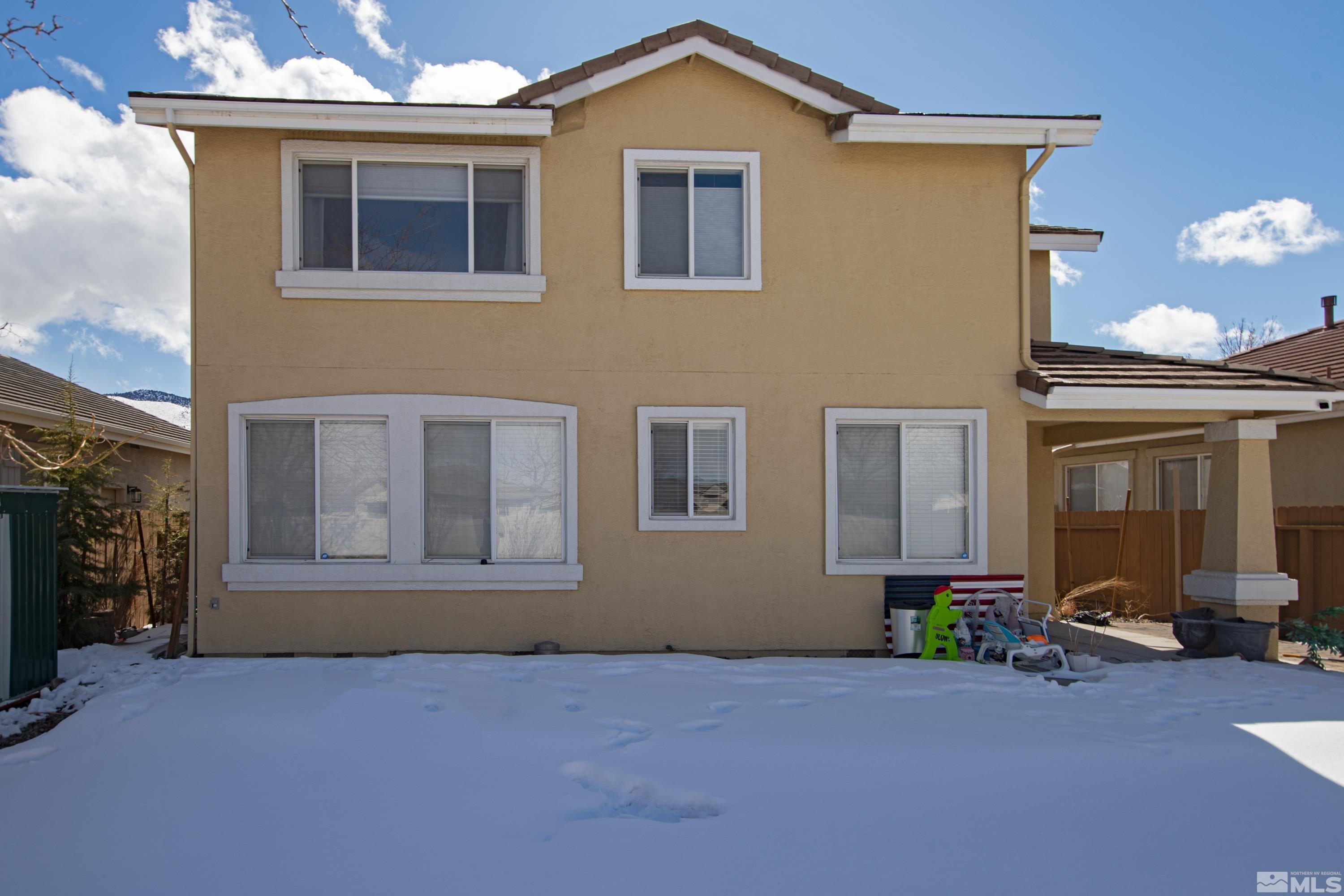 2325 Lincoln Meadows Drive Reno, NV 89521 - Photo 34 of 40 a front view of a house with yard