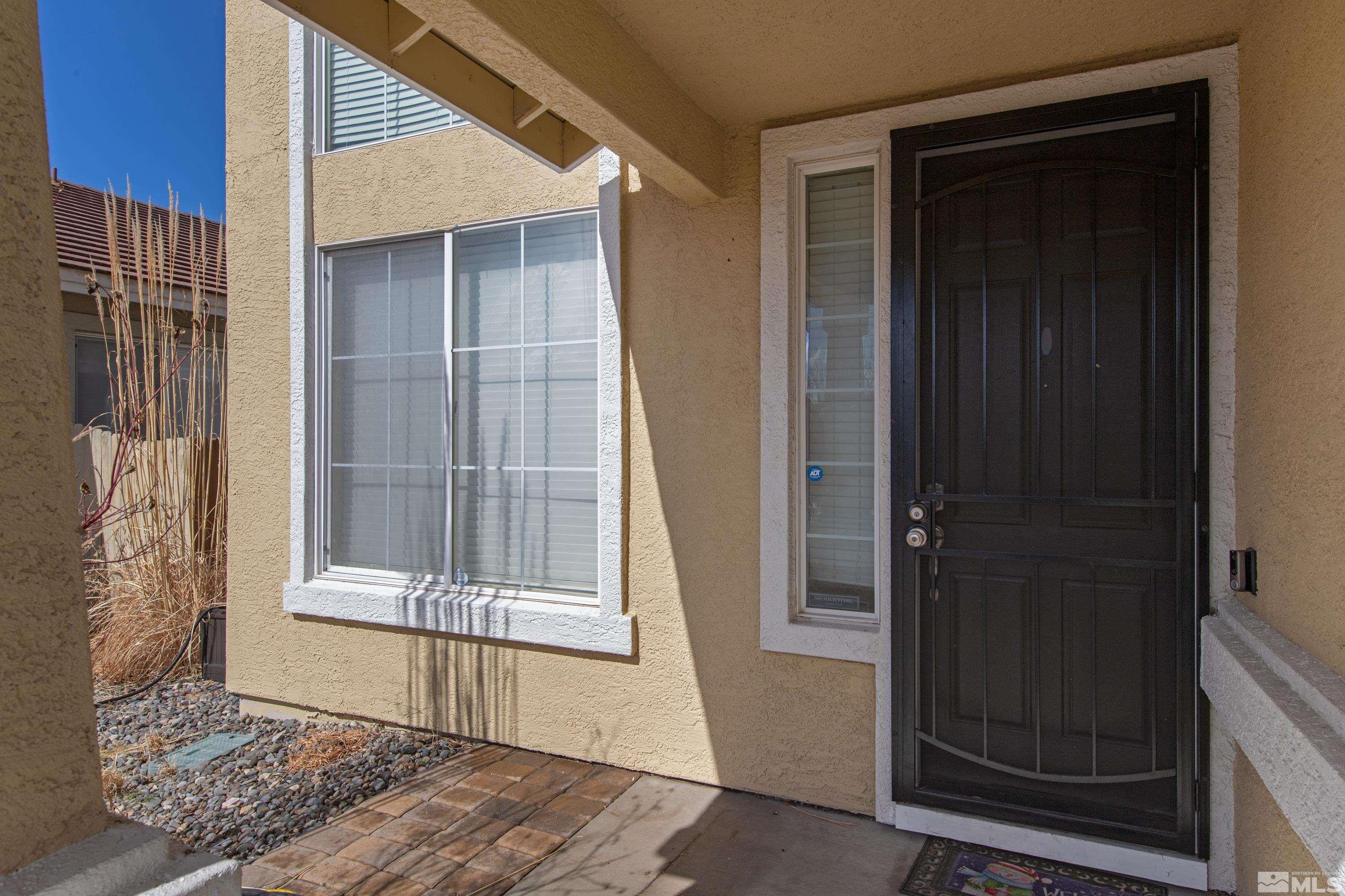 2325 Lincoln Meadows Drive Reno, NV 89521 - Photo 4 of 40 a view of front door of a house