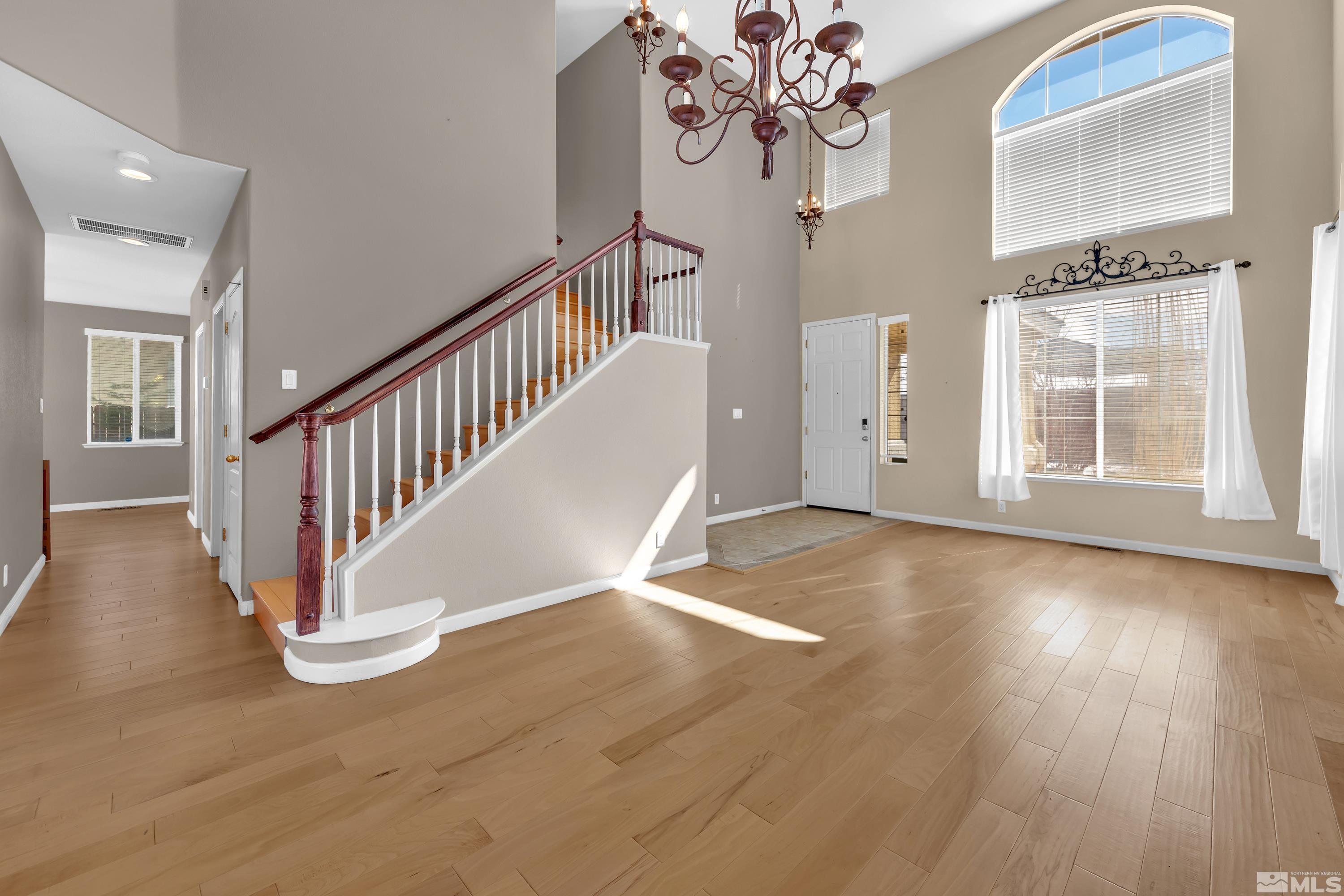 2325 Lincoln Meadows Drive Reno, NV 89521 - Photo 5 of 40 en view interior of a house with wooden floor door and windows