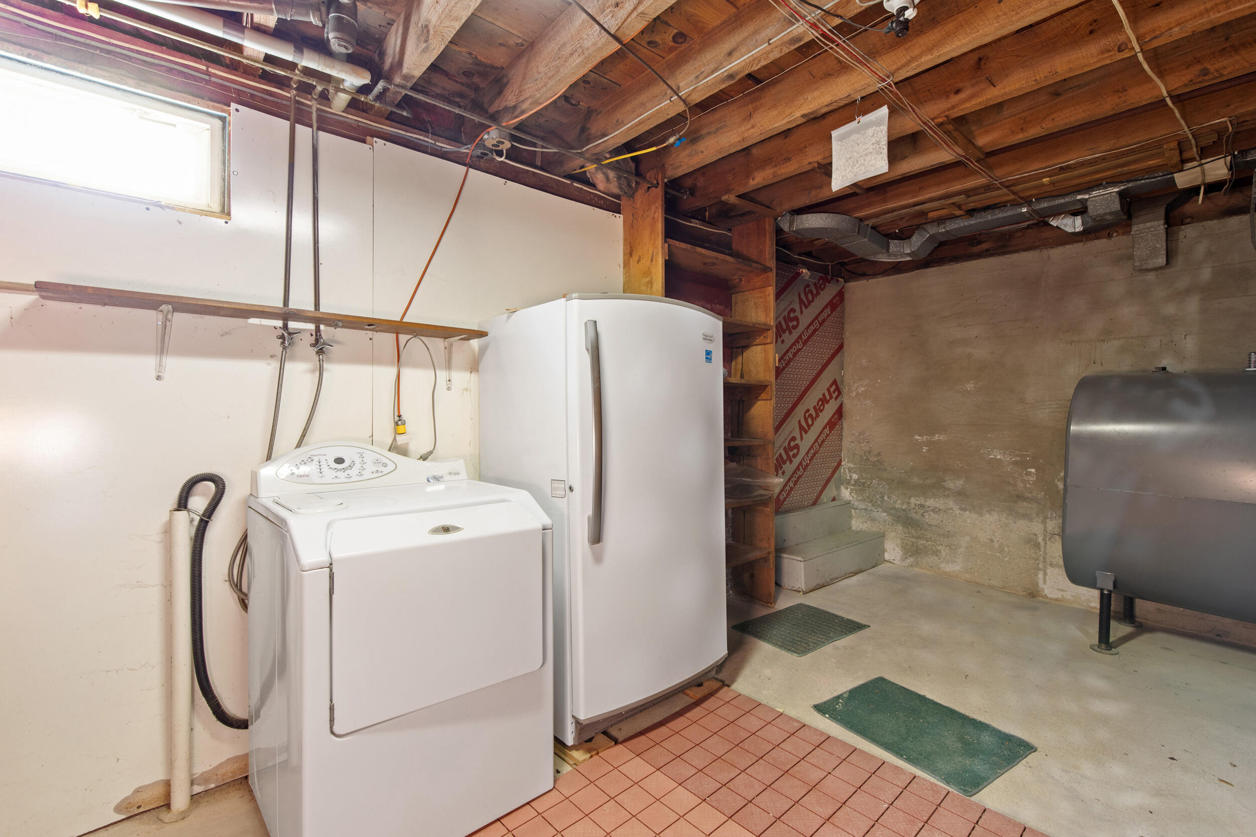 107 West Gray Road Gray, ME 04039 - Photo 20 of 26 basement with washer and freezer