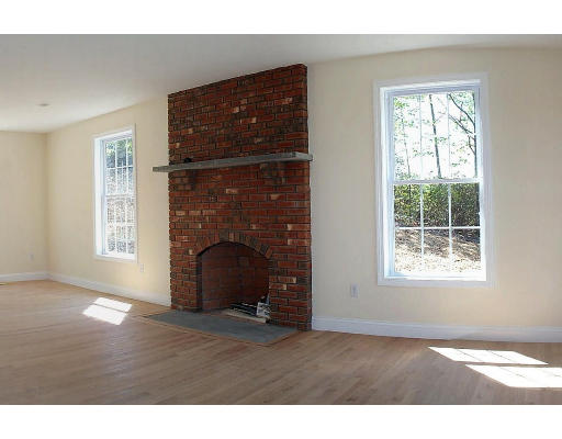 Lot 10 Simonds Road Ashby, MA 01431 - Photo 6 of 10 a view of empty room with windows and fireplace