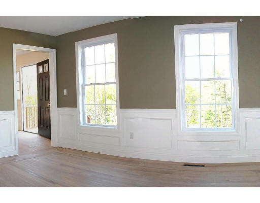 Lot 10 Simonds Road Ashby, MA 01431 - Photo 7 of 10 a view of an empty room with wooden floor and a window