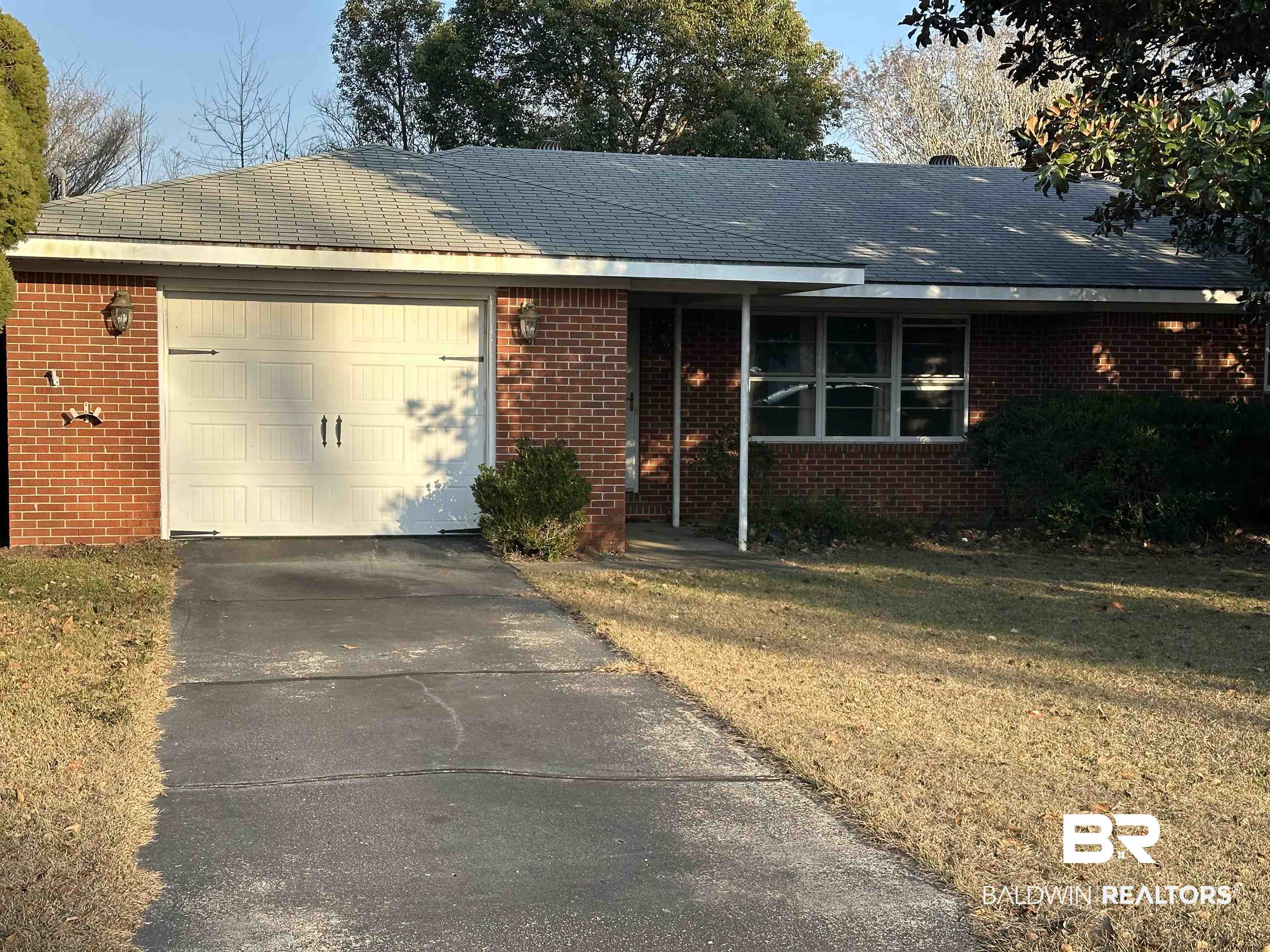 1 Yupon Circle Foley, AL 36535 - Photo 1 of 30 Ranch-style house with brick siding, concrete driveway, and a garage