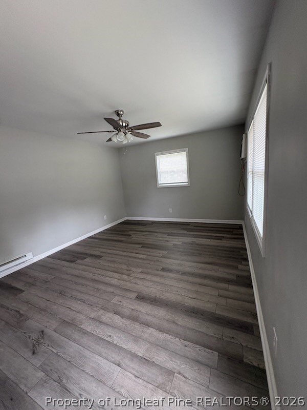 1051 Rulnick Street, Unit D Fayetteville, NC 28304 - Photo 2 of 5 a view of a room with a ceiling fan and window