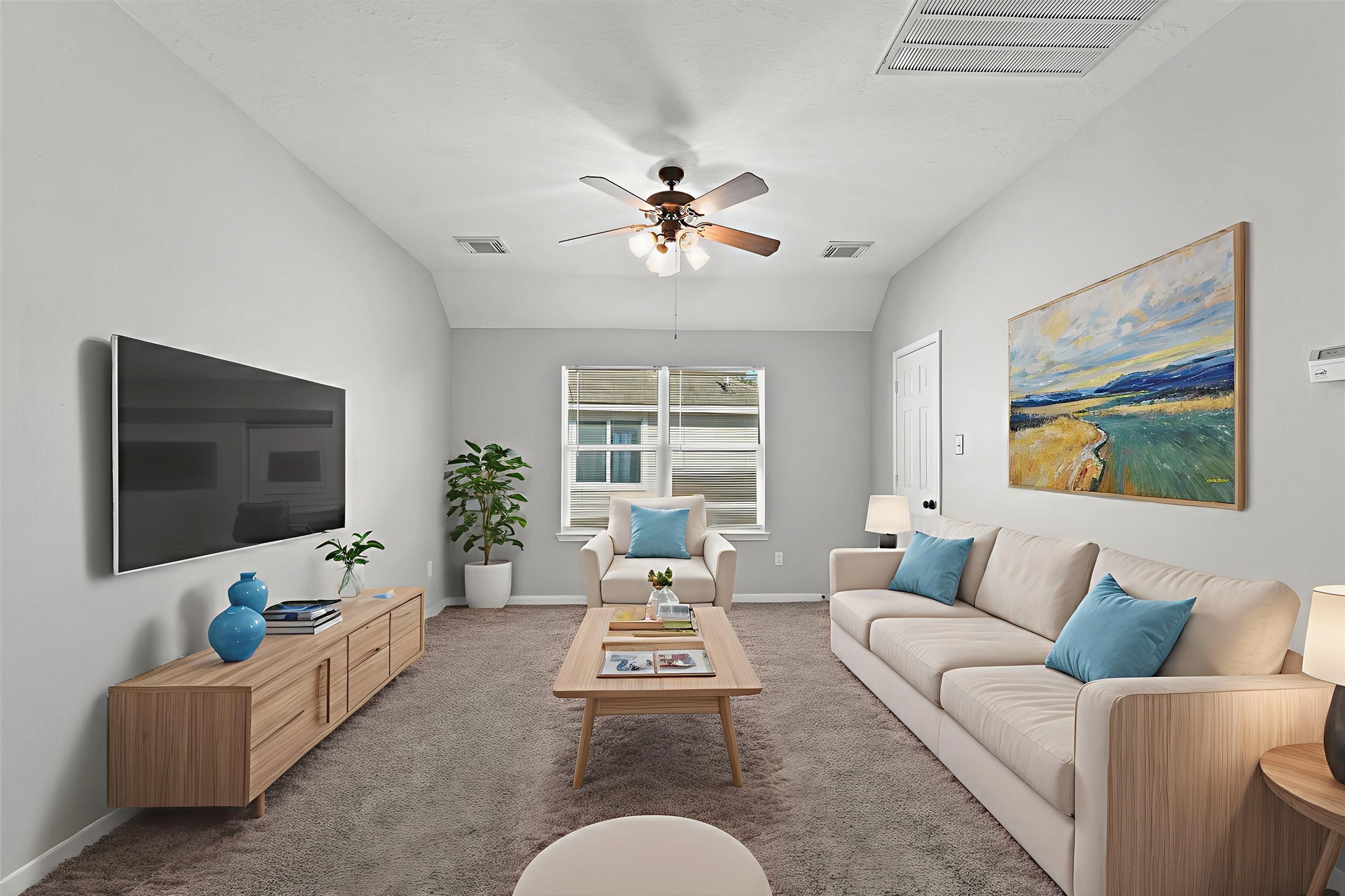 9107 Huckinston Court Spring, TX 77379 - Photo 15 of 32 a living room with furniture and a flat screen tv