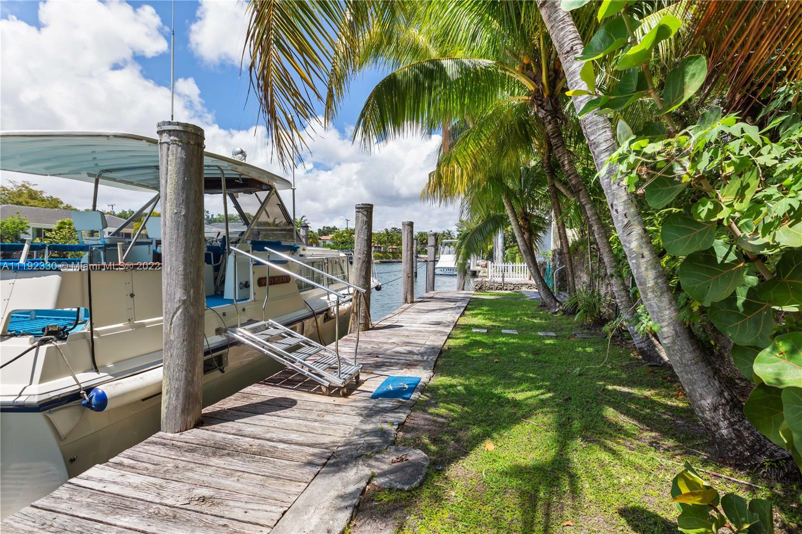 Riviera Coral Gables, FL 33146 - Photo 17 of 39 a view of a house with a yard