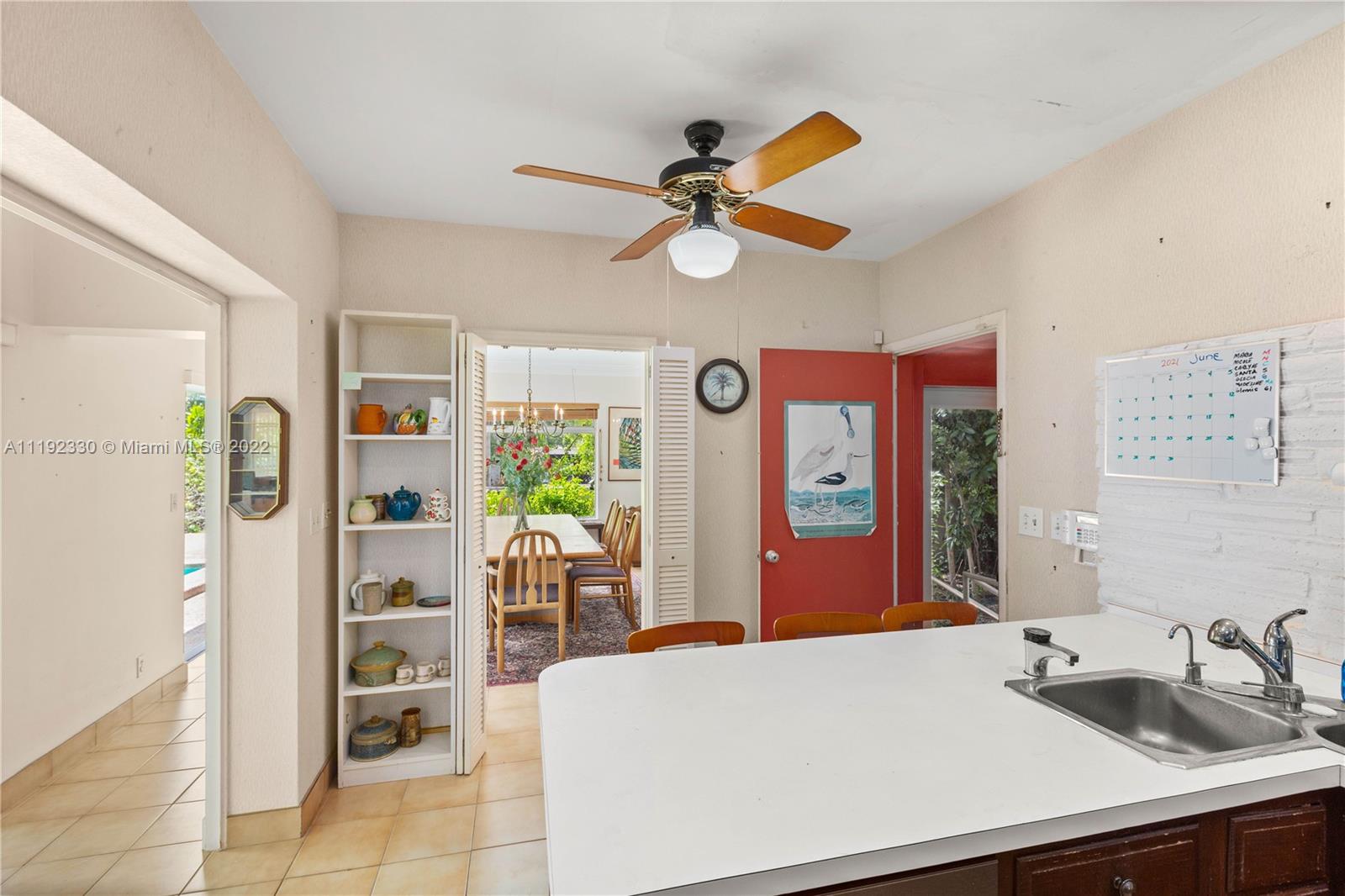 Riviera Coral Gables, FL 33146 - Photo 22 of 39 a bedroom with a bed and a table