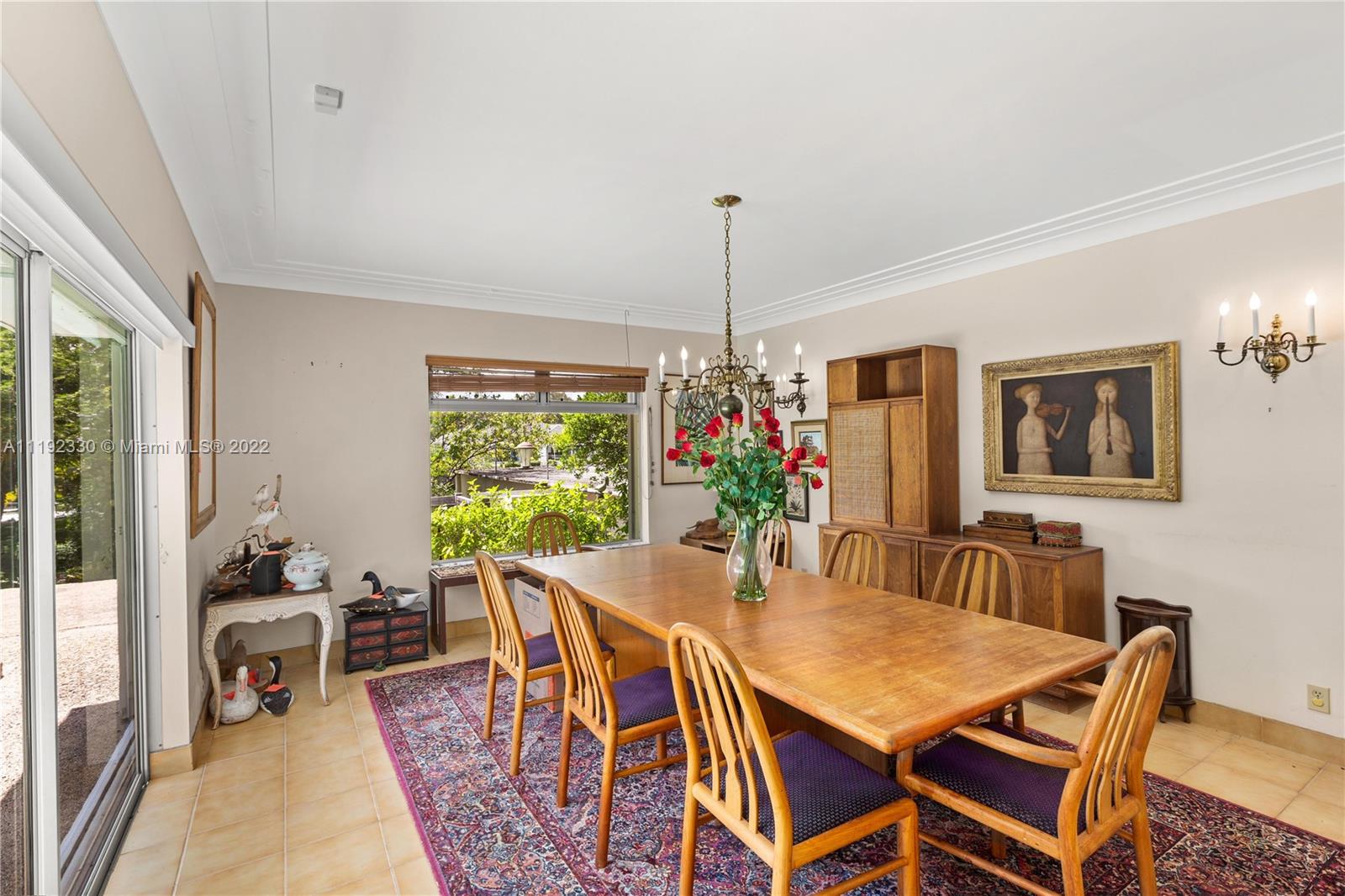 Riviera Coral Gables, FL 33146 - Photo 29 of 39 a view of a dining room with furniture window and outside view