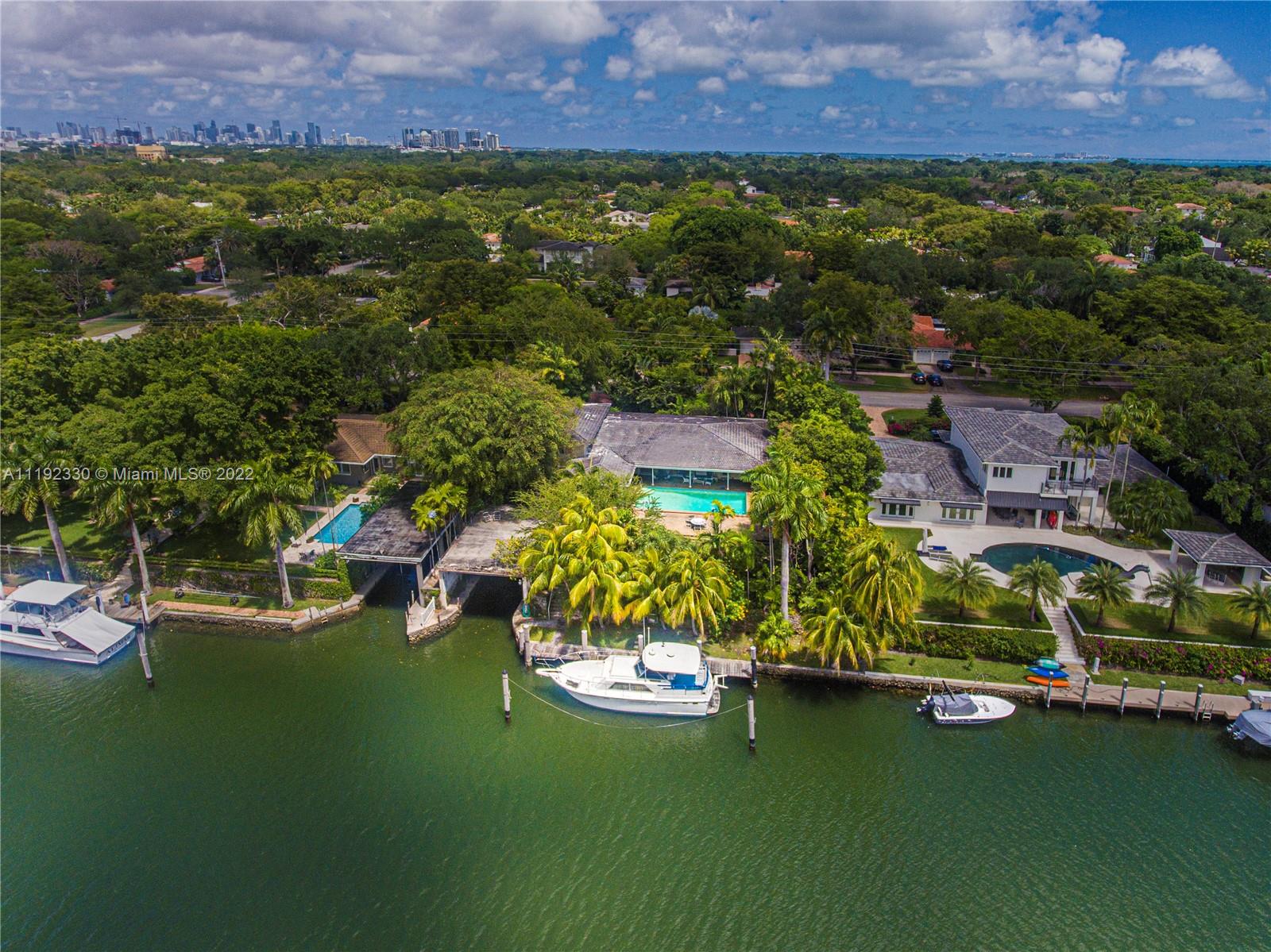 Riviera Coral Gables, FL 33146 - Photo 3 of 39 an aerial view of residential houses with outdoor space and lake view