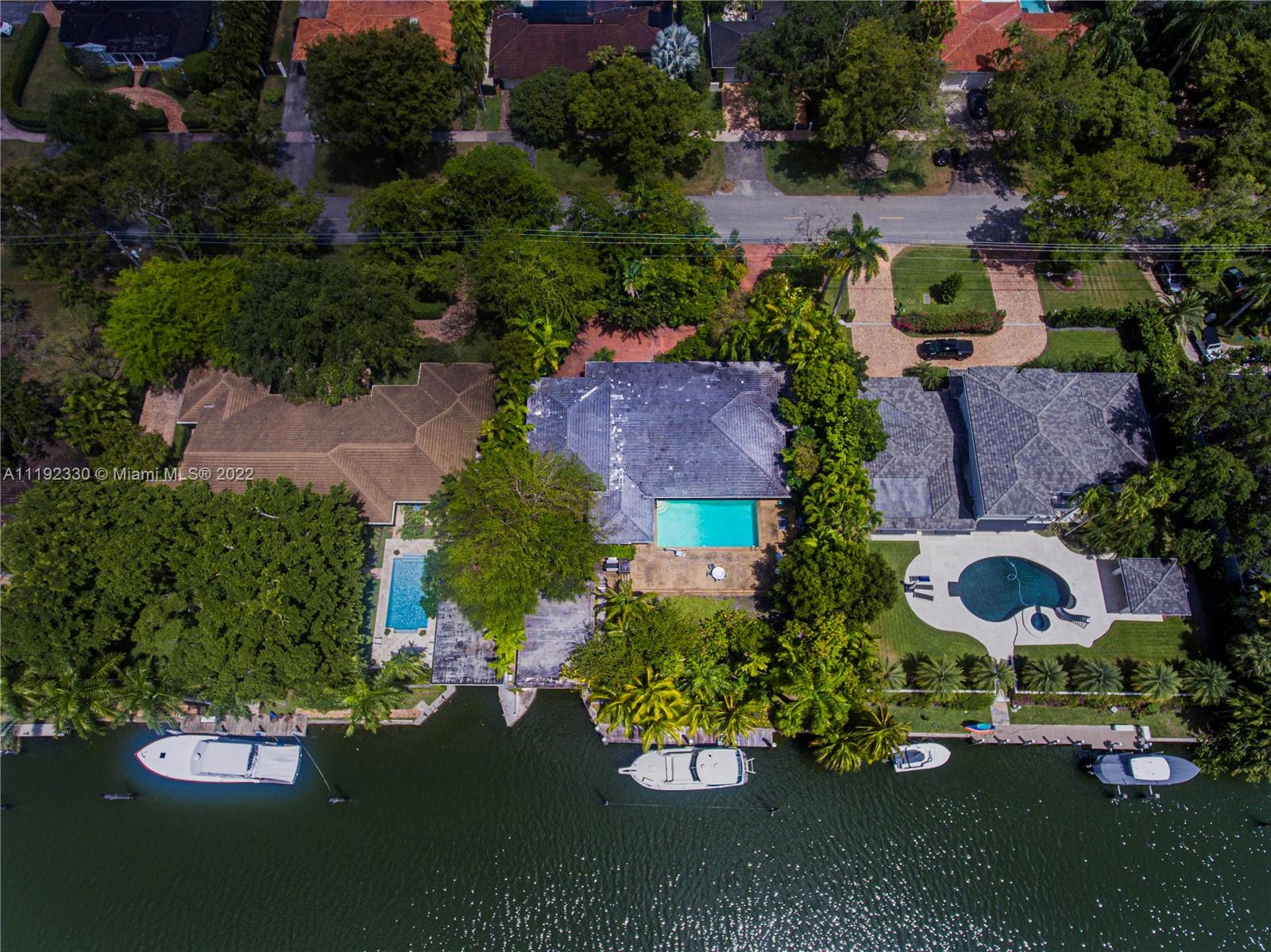 Riviera Coral Gables, FL 33146 - Photo 6 of 39 an aerial view of a house with swimming pool and outdoor seating