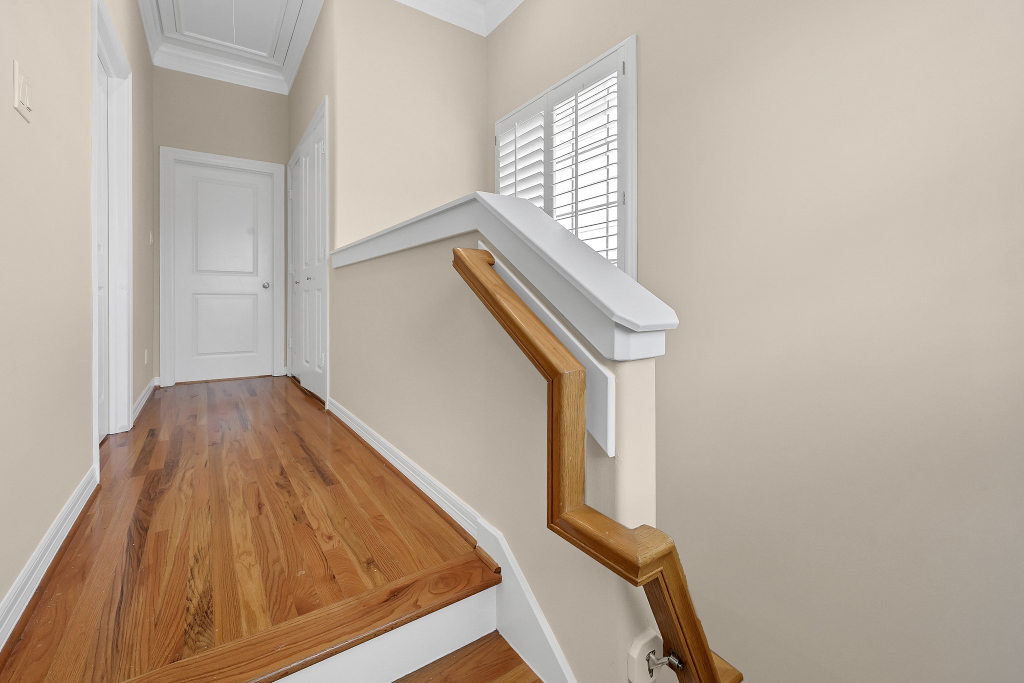 1204 Cohn Street Houston, TX 77007 - Photo 16 of 25 a view of staircase with wooden floor and white walls