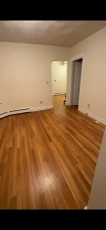 a view of room and wooden floor