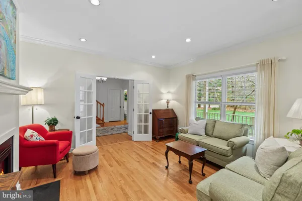 a bed room with two beds and a chandelier