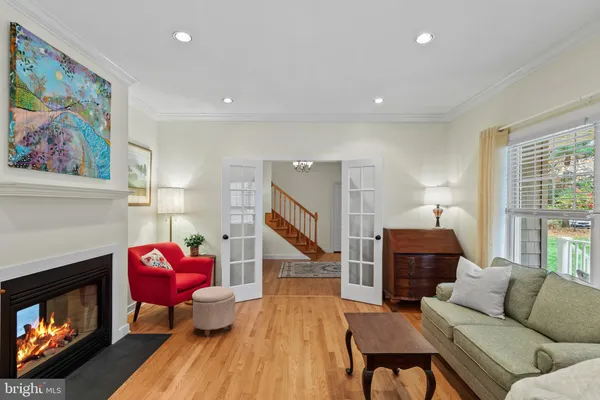 a living room with a couch and a window