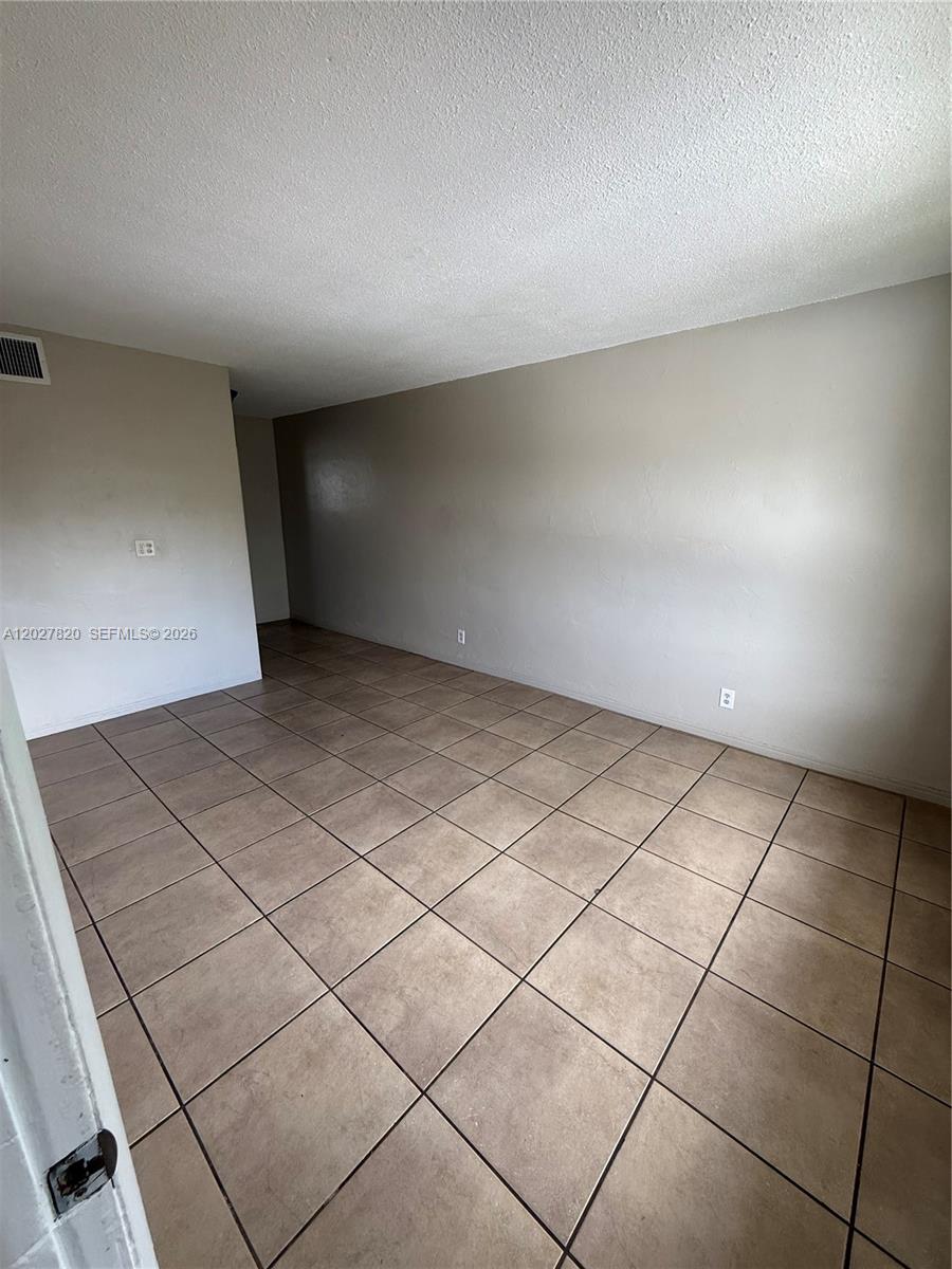 6841 Pembroke Road, Unit 15 Pembroke Pines, FL 33023 - Photo 4 of 16 a view of an empty room