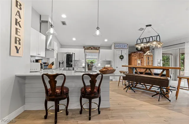 a view of a dining room with furniture