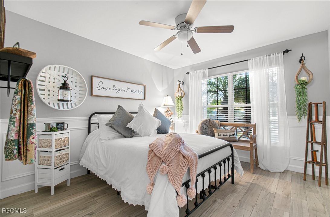 4656 Varsity Circle Lehigh Acres, FL 33971 - Photo 31 of 49 a bedroom with bed and a window