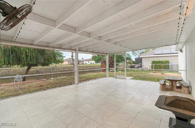 a view of a backyard with porch