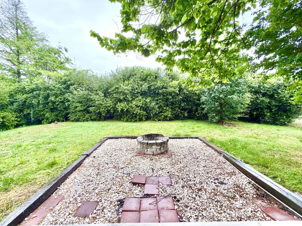 a view of backyard with green space