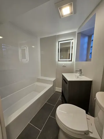 a utility room with washer and dryer