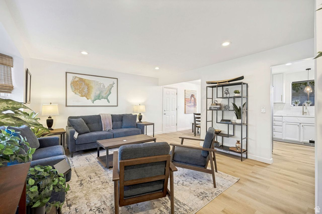 1723 Albury Road Sandy, UT 84092 - Photo 7 of 23 Bright living space featuring wood-finish flooring and recessed lighting