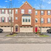 a view of a car park in front of a building