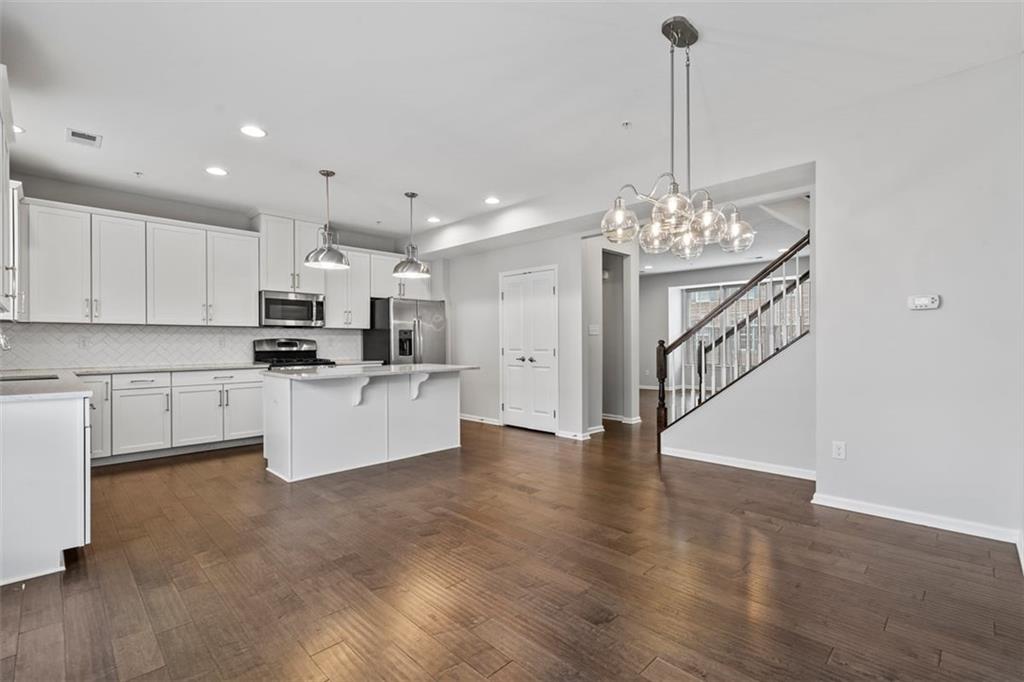 1402 Pointe View Drive Mars, PA 16046 - Photo 11 of 25 a large white kitchen with lots of counter space and appliances