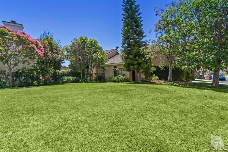 560 Fairfield Road Simi Valley, CA 93065 - Photo 2 of 32 a front view of a house with garden
